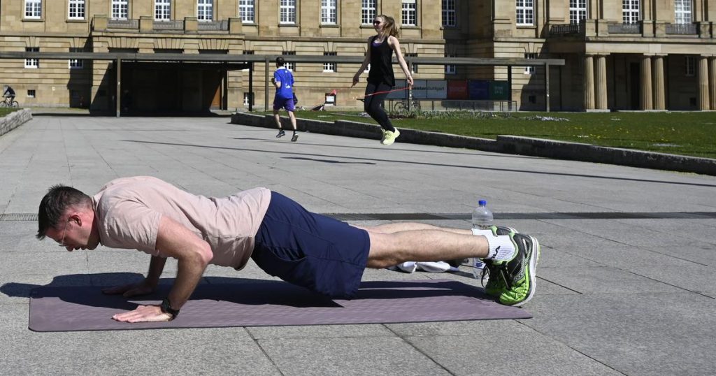 A man doing workouts on floor